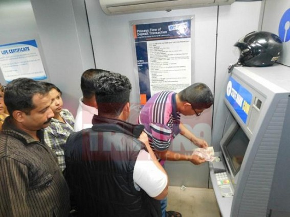 Long queues outside ATMS, petrol pumps observed at Agartala : Public said, 'Anything for nation's welfare !'